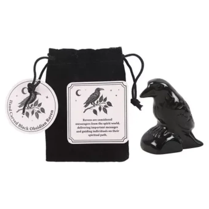 Ornement de corbeau en obsidienne noire dans un sac