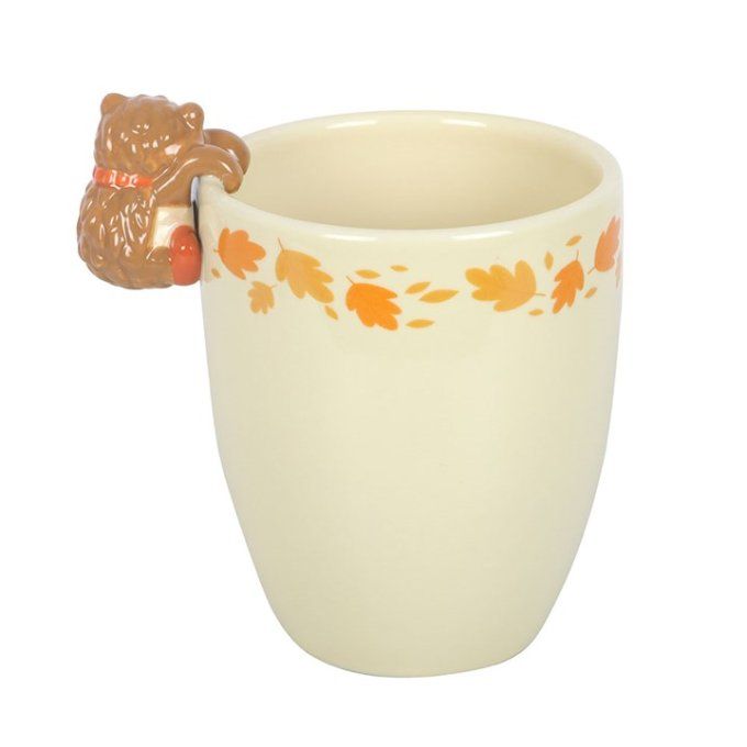 Pot de fleurs d'automne avec hérisson
