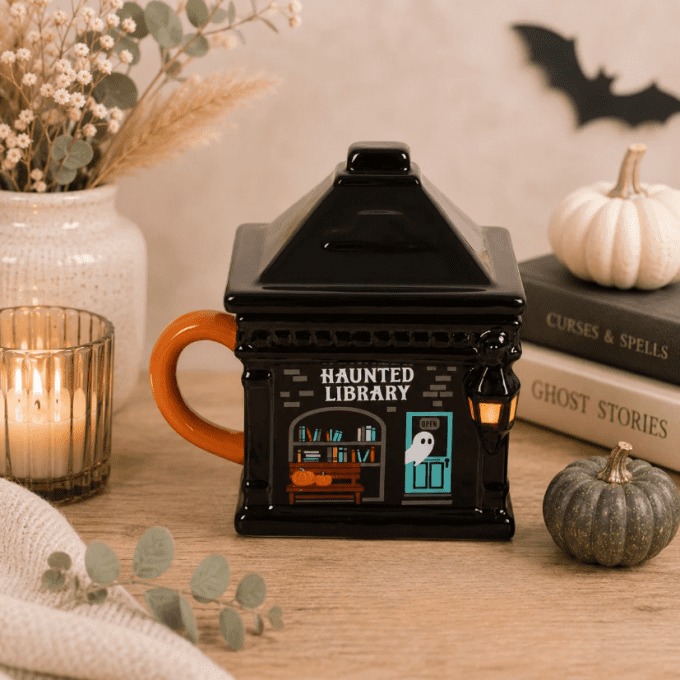 Tasse avec couvercle « Bibliothèque hantée »
