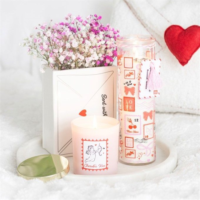 Bougie tube rose imprimée timbre-poste