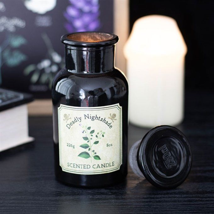Bougie parfumée dans un flacon apothicaire